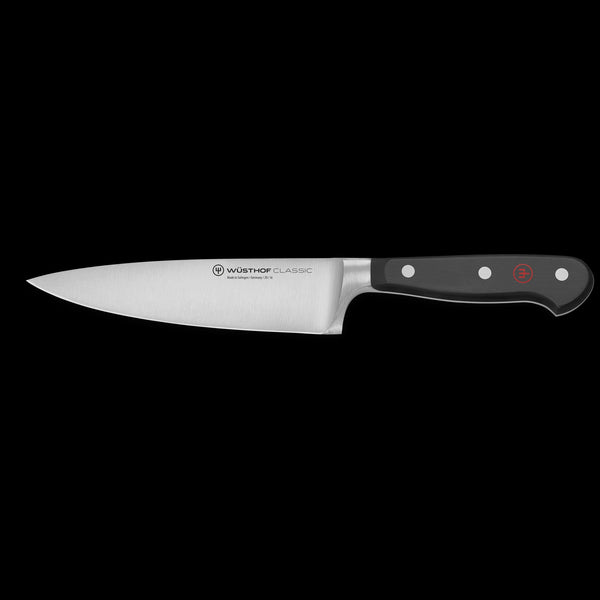 Chef Knife with a black handle on a white background