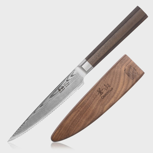 Serrated utility knife with wooden sheath on a white background