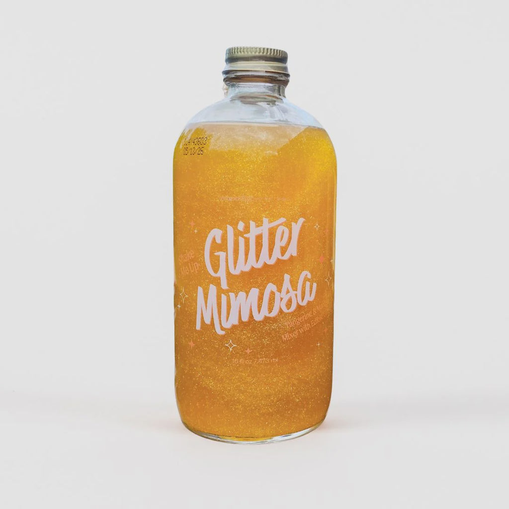 Bottle of 'Glitter Mimosa' on a white background
