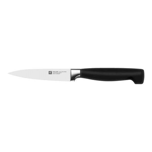 Paring knife with black handle on a white background