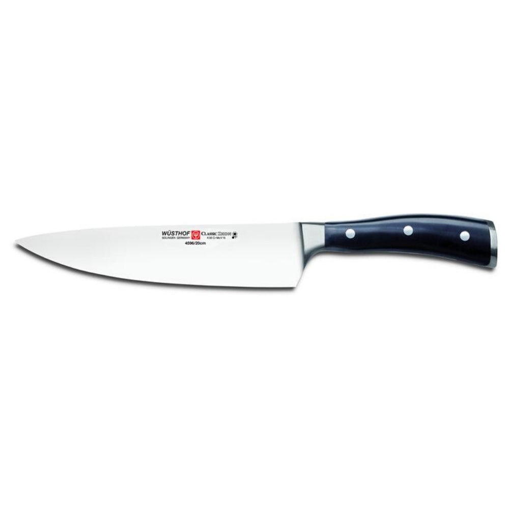 Wusthof Chef's knife with a black handle on a white background