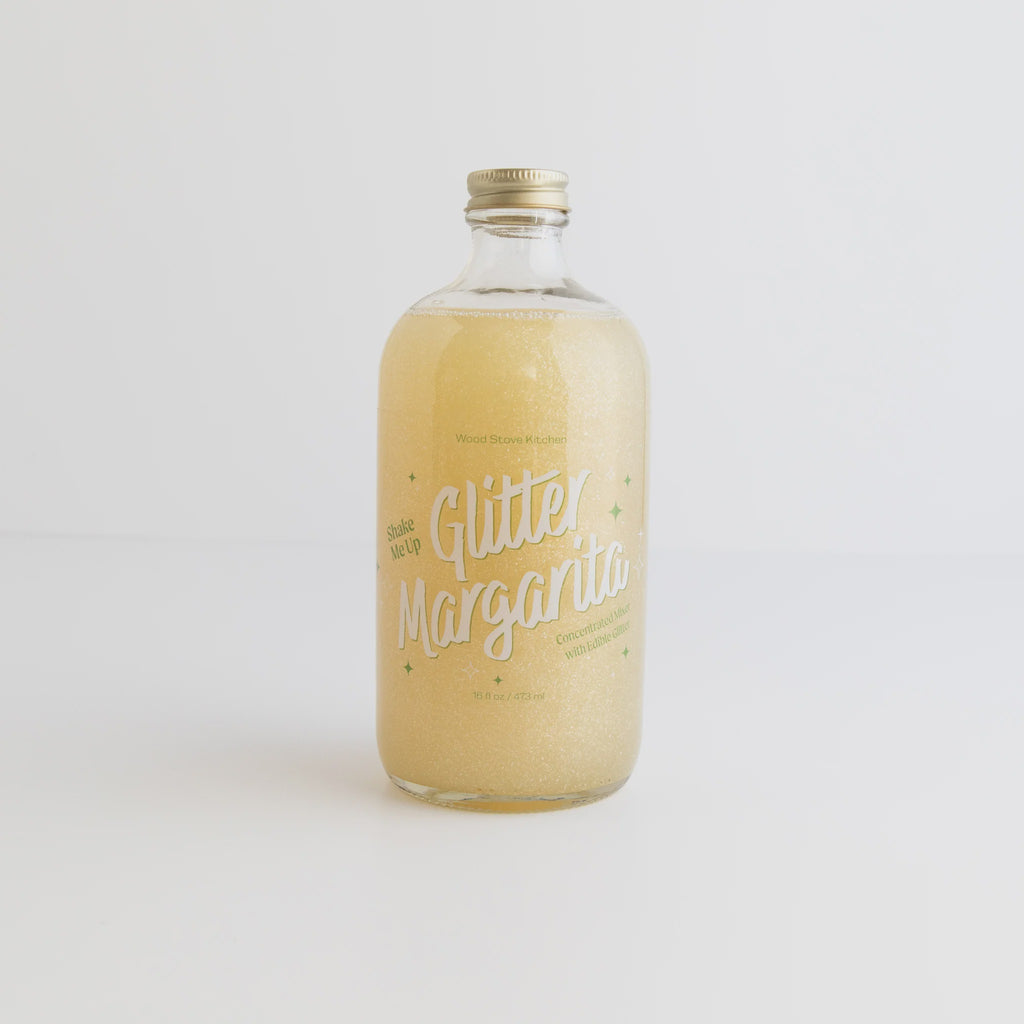 Bottle of 'Glitter Margarita' cocktail mixer on a white background