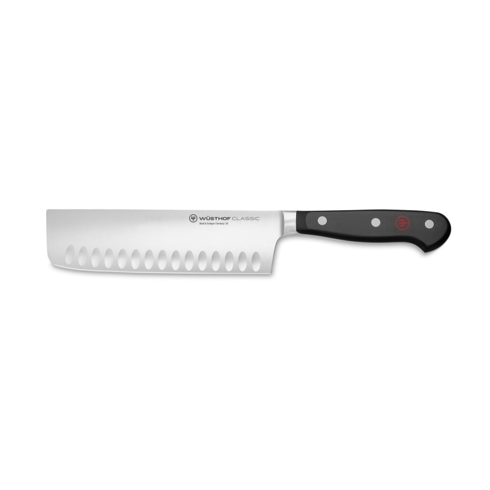 Wusthof Nakiri knife with black handle on a white background