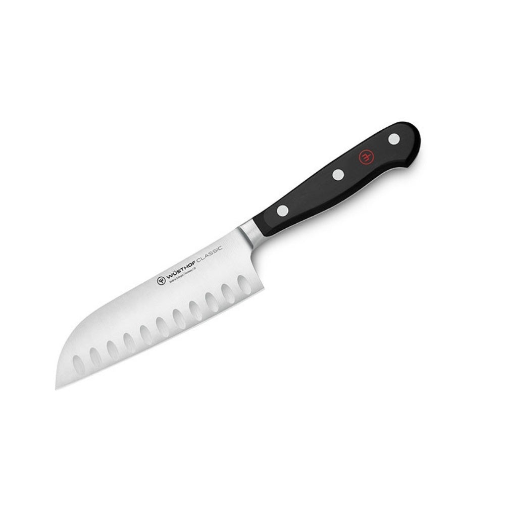 Hollow Edge Santoku Knife with a black handle on a white background