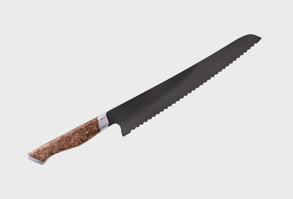 Serrated bread knife with wooden handle on a white background